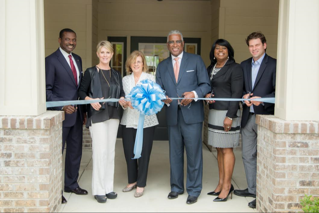 From left, Leroy Abrahams of Regions Bank, Sally Mackin and Gillian Goodrich of Woodlawn Foundation, Birmingham Mayor William A. Bell, Sr., Marcela Roberts of Hollyhand Companies, Ethan Davidson of Purpose Built Communities. 