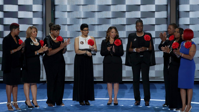 Mothers of the Movement (L-R) Maria Hamilton, mother of Dontre Hamilton; Annette Nance-Holt, mother of Blair Holt; Gwen Carr, mother of Eric Garner; Geneva Reed-Veal, mother of Sandra Bland; Lucia McBath, mother of Jordan Davis; Sybrina Fulton, mother of Trayvon Martin; and Cleopatra Pendleton-Cowley, mother of Hadiya Pendleton; Lezley McSpadden, Mother of Mike Brown and Wanda Johnson, mother of Oscar Grant; and Lezley McSpadden, Mother of Mike Brown stand on stage prior to delivering remarks on the second day of the Democratic National Convention at the Wells Fargo Center, July 26, 2016 in Philadelphia, Pennsylvania. Democratic presidential candidate Hillary Clinton received the number of votes needed to secure the party's nomination. An estimated 50,000 people are expected in Philadelphia, including hundreds of protesters and members of the media. The four-day Democratic National Convention kicked off July 25.  (Photo by Alex Wong/Getty Images)