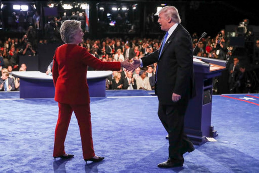 Democratic presidential nominee Hillary Clinton shakes hands with Republican presidential nominee Donald Trump after the presidential debate at Hofstra University in Hempstead, N.Y., Monday, Sept. 26, 2016. (Joe Raedle/Pool via AP)