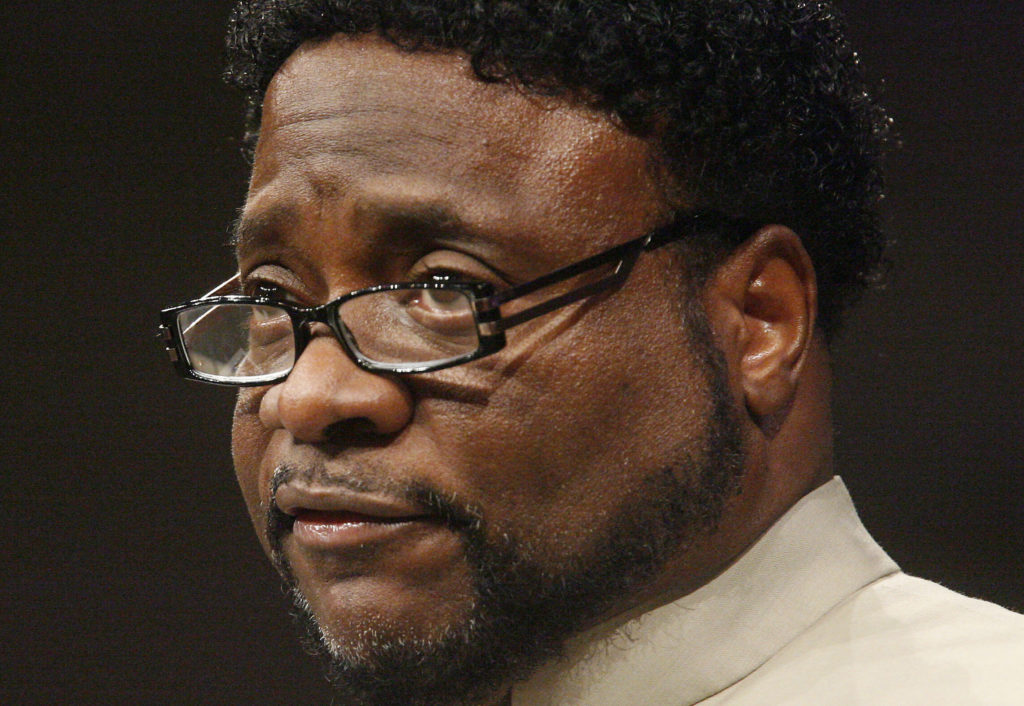FILE - In this Sept. 26, 2010 file photo, Bishop Eddie Long speaks at New Birth Missionary Baptist Church near Atlanta. Long, a prominent pastor who led one of metro Atlanta's largest churches, died Sunday, Jan. 15, 2017, the New Birth Missionary Baptist Church said in a statement to local media outlets. He was 63. (AP Photo/John Amis, Pool, File)