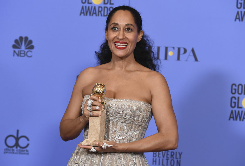Tracee Ellis Ross poses in the press room with the award for best performance by an actress in a television series - musical or comedy for "Black-ish" at the 74th annual Golden Globe Awards at the Beverly Hilton Hotel on Sunday, Jan. 8, 2017, in Beverly Hills, Calif. (Photo by Jordan Strauss/Invision/AP)