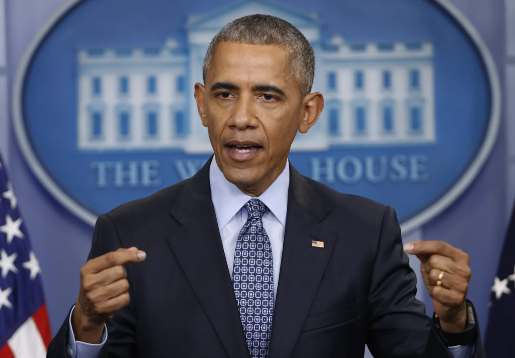 In this Jan. 18, 2017 file photo, President Barack Obama speaks during his final presidential news conference, in the briefing room of the White House in Washington. A spokesman for Obama says the former president "fundamentally disagrees" with discrimination that targets people based on their religion. The statement alluded to but did not specifically mention President Donald Trump's temporary ban on refugees from several Muslim-majority countries. (Pablo Martinez Monsivais, Associated Press, File)