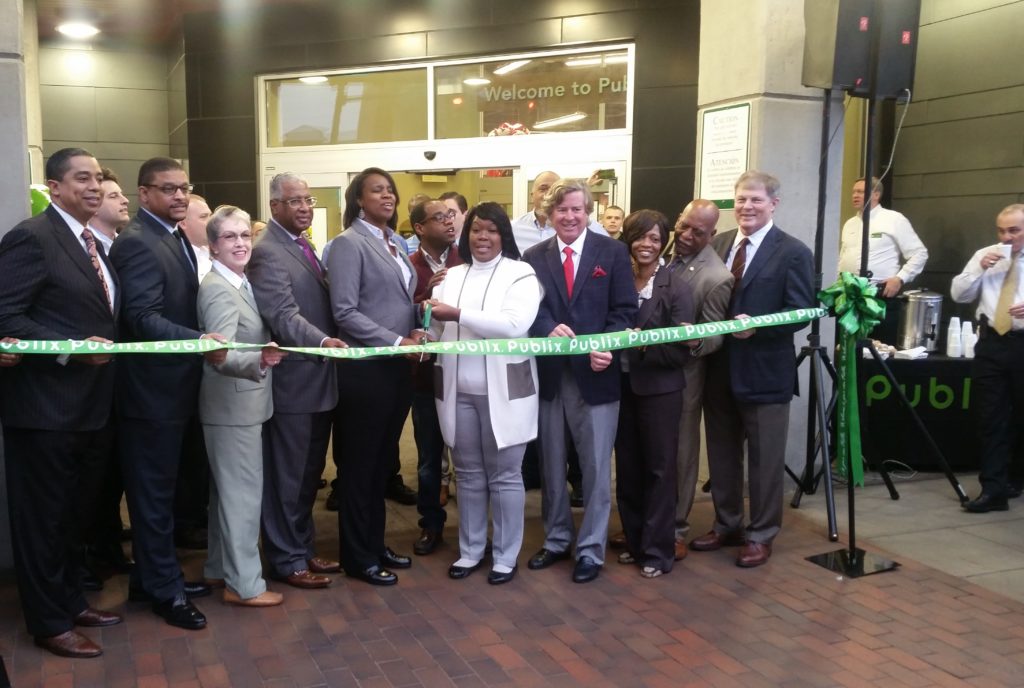 From left: Birmingham City Councilors Jay Roberson, Marcus Lundy, Valerie Abbott, Birmingham Mayor William Bell, Publix Store Manager Ginnie Donald, Council President Johnathan Austin, Councilor Sheila Tyson, businessman Scott Bryant, City of Birmingham's Lisa Cooper, Sen. Rodger Smitherman and Midtown Property owner Dick Schmaltz. (James Lewis III, The Birmingham Times)