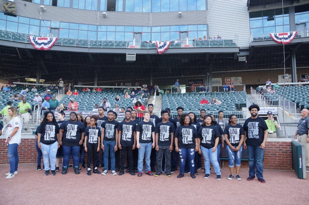 The Restoration Academy Chorale performed at a Birmingham Barons game. They will soon travel to New York. (Provided photo)