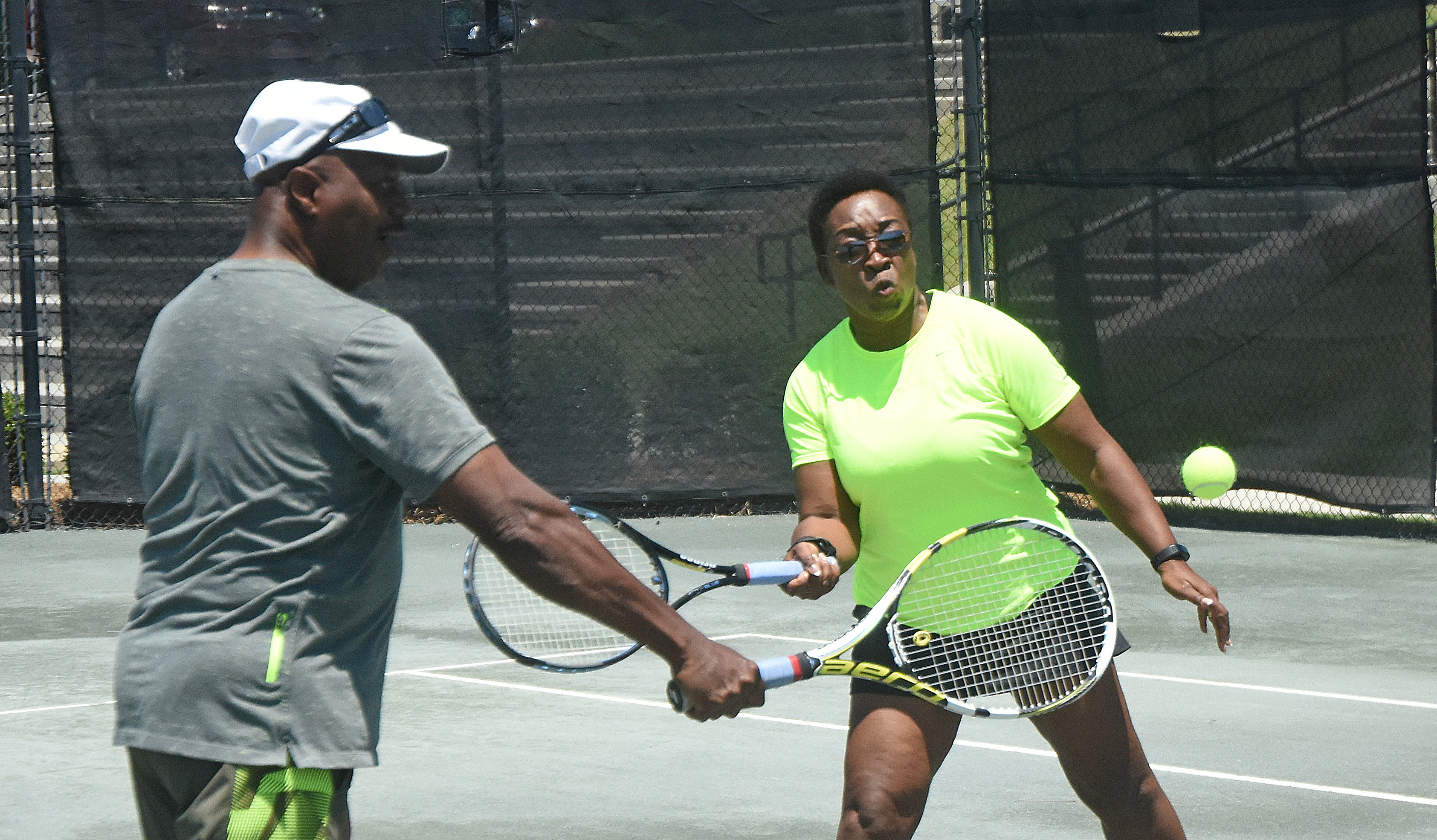 Earl and Betty Austin train at Pelham Racquet Club. The Pelham couple – he’s 68 and she’s 66 – will play mixed doubles in the National Senior Games in Birmingham. (Solomon Crenshaw Jr./For The Birmingham Times).