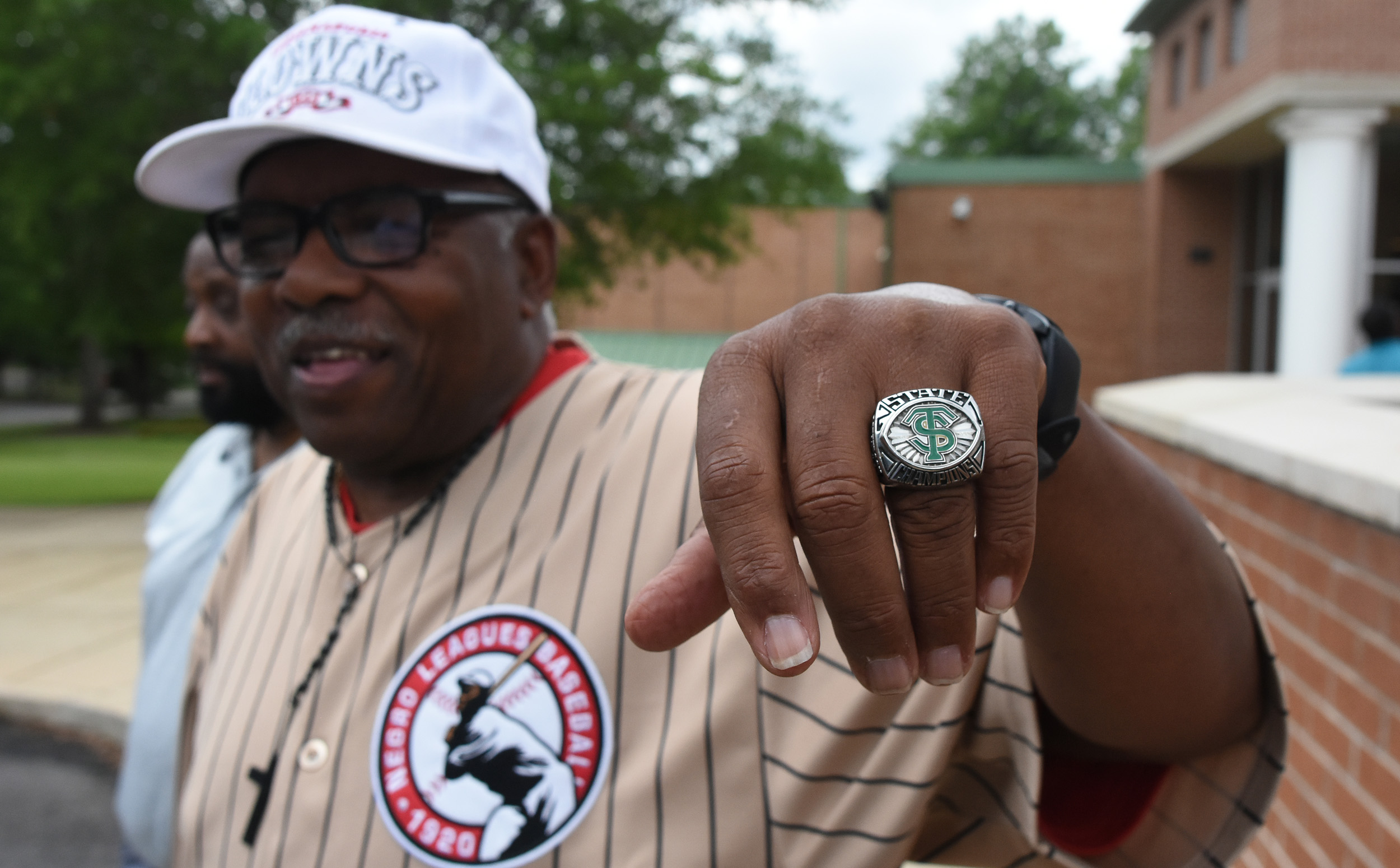 Russell "Crazy Legs" Patterson of the Indianapolis Clowns from the Negro American League displays a championship ring. (Solomon Crenshaw Jr./For The Birmingham Times).