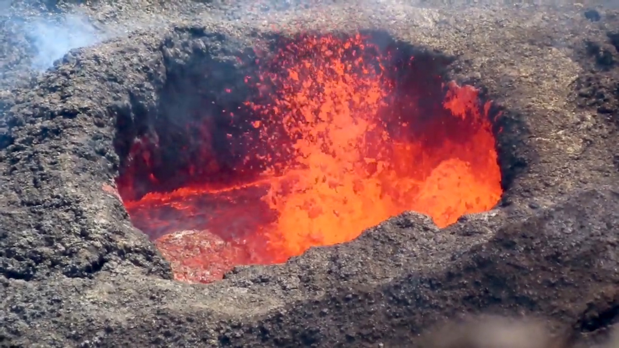 Lava sloshing and spattering in the west vent in Halema‘uma‘u crater at Kīlauea volcano. (U.S. Geological Survey/Zenger News)