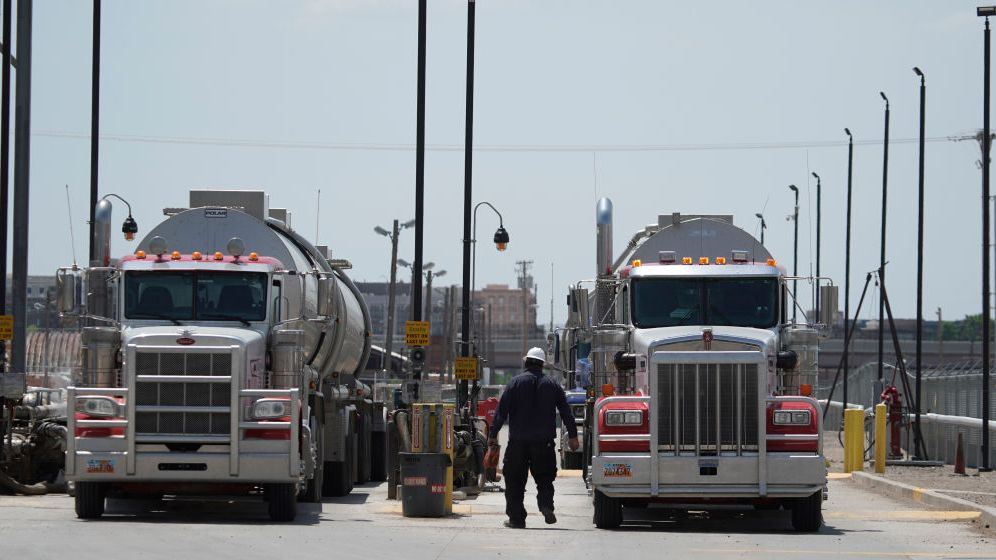 Drivers line up their tanker trucks to deliver crude oil to Marathon Oil to be refined into gas in Salt Lake City, Utah. (George Frey/Getty Images)