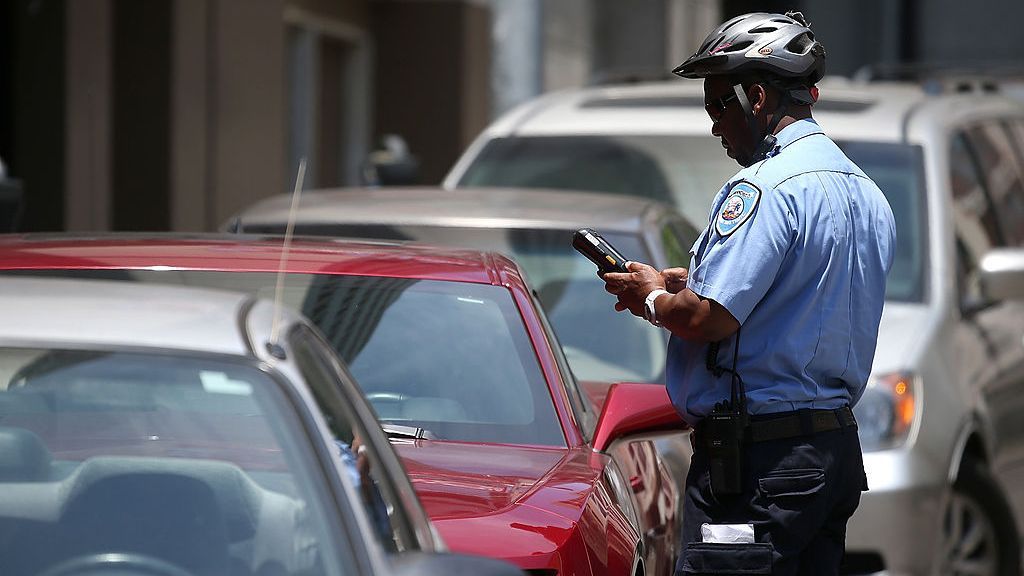 Parking tickets are a headache for those who park in city spaces. One startup aims to help reduce parking tickets for drivers. (Justin Sullivan/Getty Images)