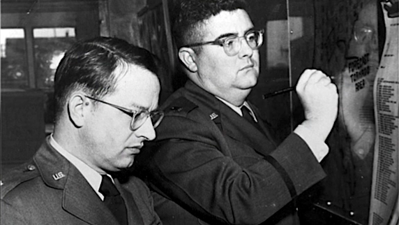 Air Force Maj. Ernest J. Fawbush (left) and Capt. Robert C Miller issued the first tornado forecast in 1948. Forecasters at the time relied mainly on hand-drawn weather maps, data from weather balloons and a radar system that was originally intended for use on B-29 bombers. (United States Air Force)