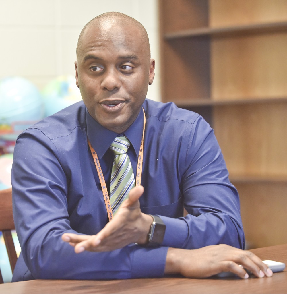Wayne Jackson has started a mountian biking team at Hayes K-8 School near Kingston. An initiative had been launched to recruit African American male teachers to Birmingham City Schools. (Frank Couch/The Birmingham Times)