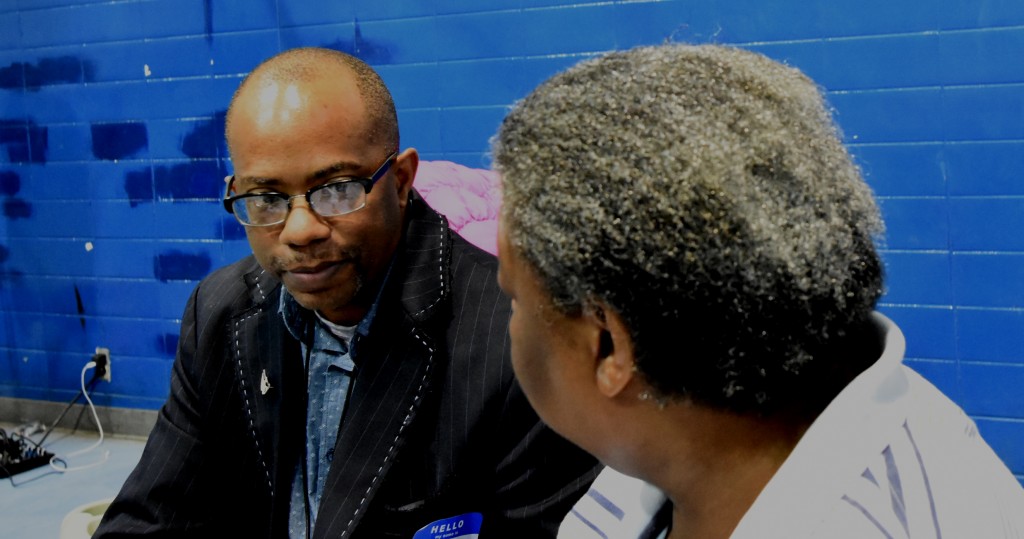 Phillip Turner talks with a 'match' during NetWork Night in Collegeville