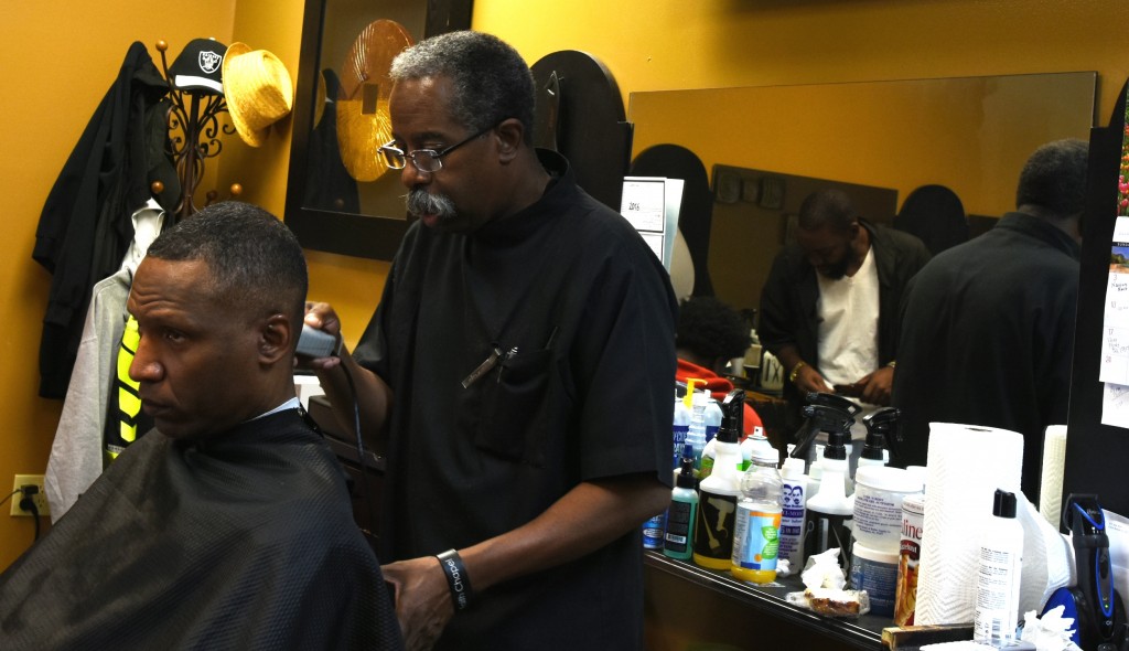 Willie Etheridge, Jr., owner of Etheridge Brothers barbershop in downtown Birmingham, said he learned a lot growing up in the family business. (Solomon Crenshaw Jr. photo).
