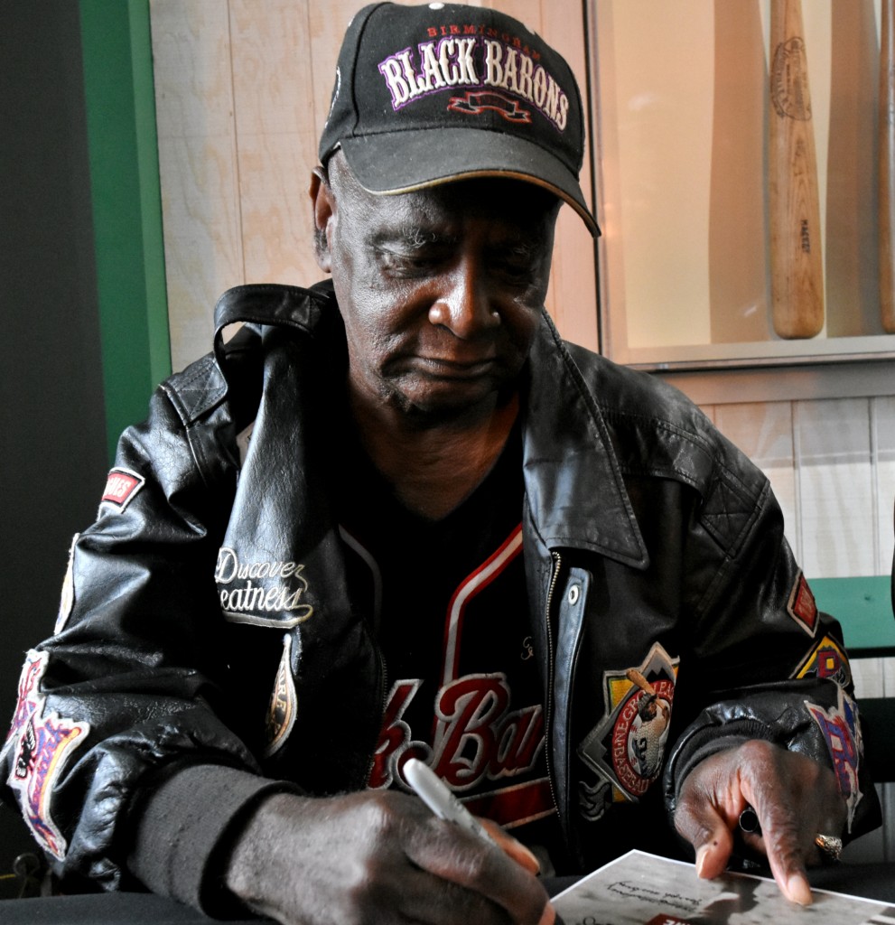 Former Birmingham Black Baron Henry Elmore signs autographs. (Solomon Crenshaw Jr. photo).