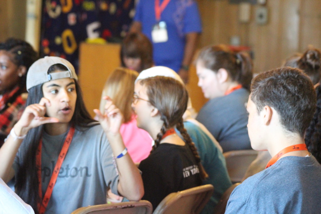  Students socialize before they get the day started at Anytown Alabama, a retreat where students from all over the state learn how they can be part of the solution of inclusivity and fairness. (Ariel Worthy/Birmingham Times) Kathryn Sesser  