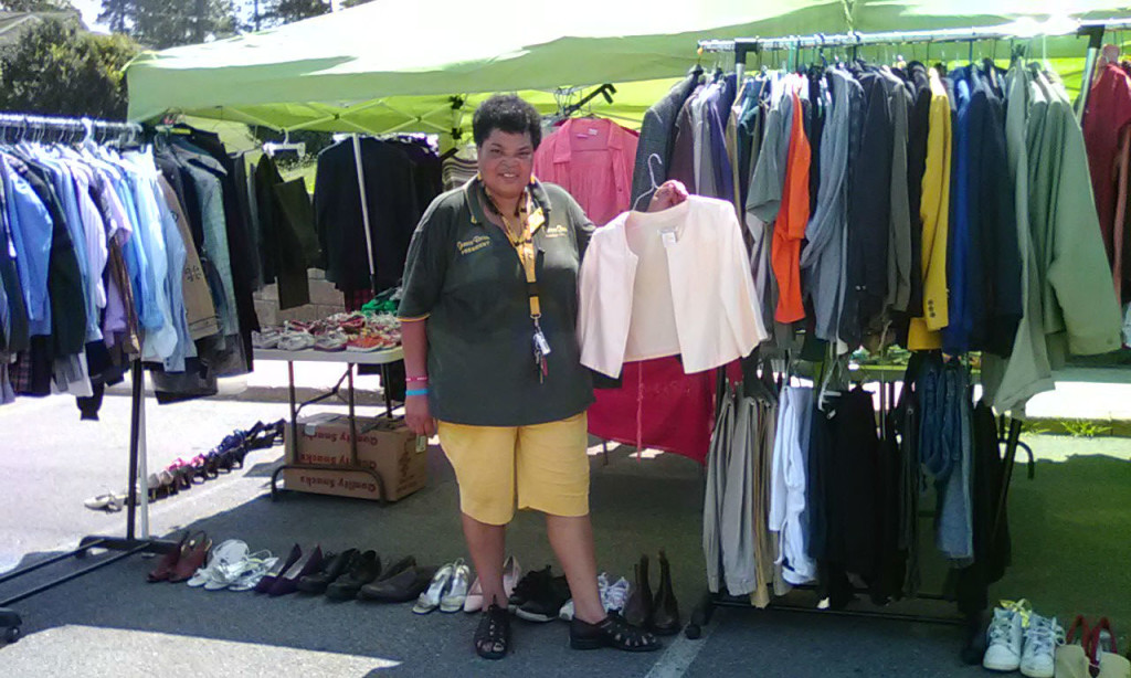 Geneva Brown, president of the Cooper Green Residents Council, collected clothes, organized them, and withstood 100-degree heat to operate a two-day pop-up boutique. Brown coordinated the free clothing giveaway for her neighbors. (Provided photos)
