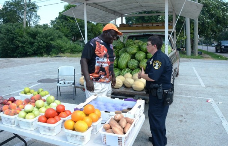 Birmingham Police Officer Heather Campbell places a high priority on conversation with the people she serves. (Karim Shamsi-Basha, Alabama NewsCenter)