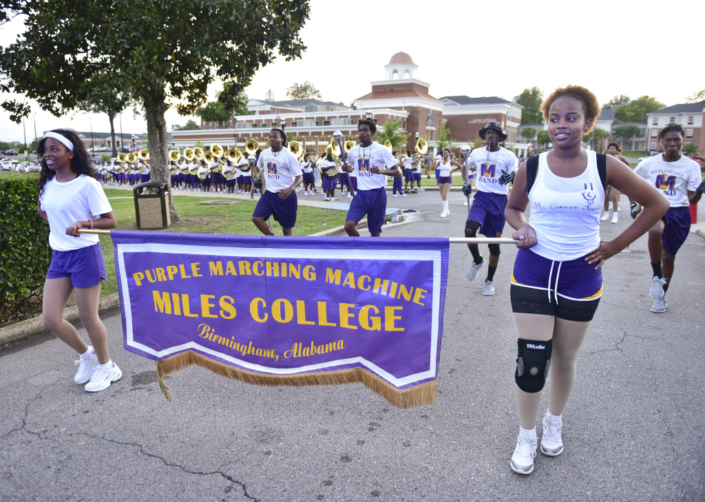 Members of the Purple Marching Machine made their way from the band room around the campus before an on-the-field practice. Practice is underway in Fairfield for the Miles College band, whose season begins Sept. 4. (Frank Couch photos, The Birmingham Times)