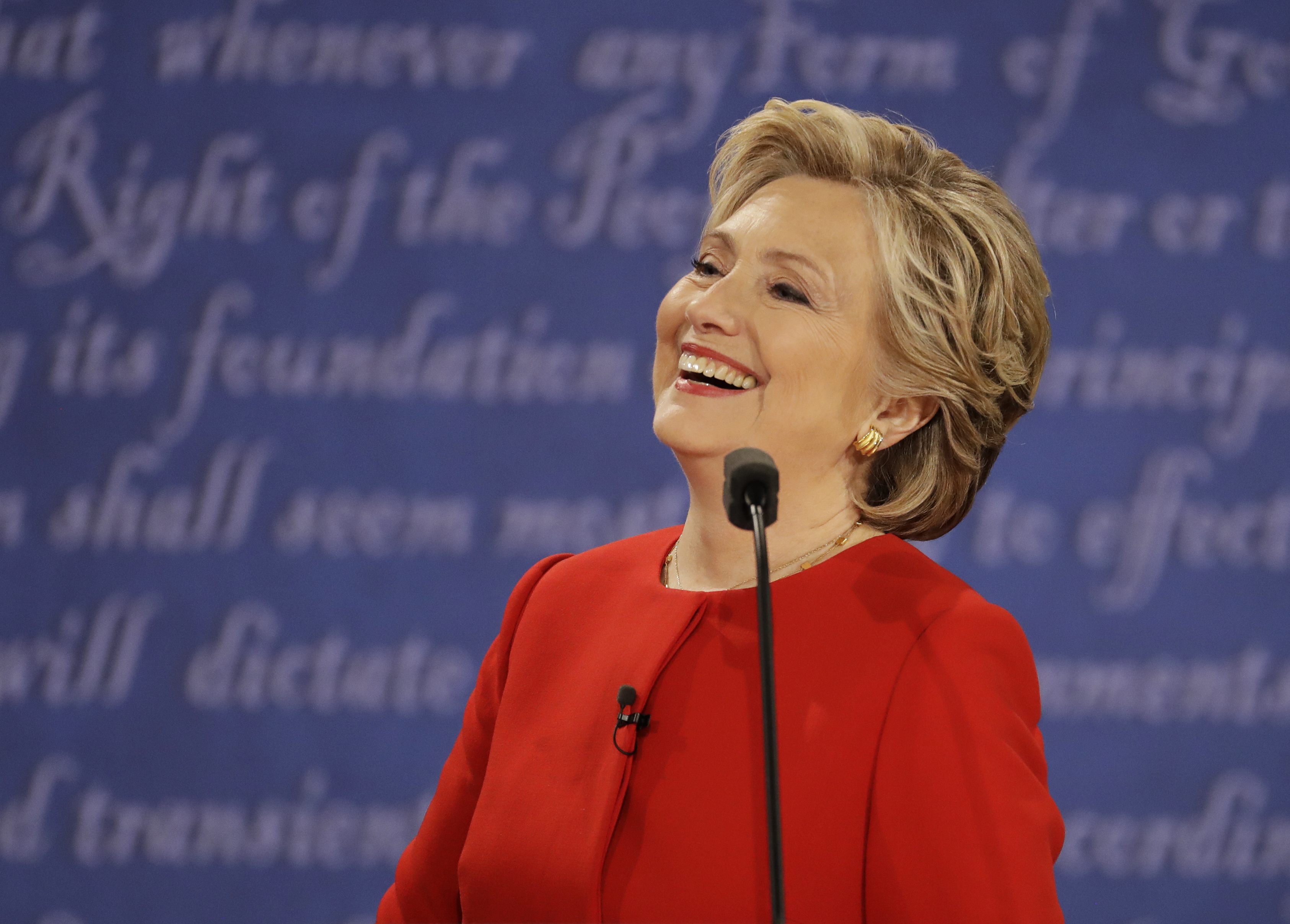 Democratic presidential nominee Hillary Clinton laughs to Republican presidential nominee Donald Trump during the presidential debate at Hofstra University in Hempstead, N.Y., Monday, Sept. 26, 2016. (Julio Cortez, Associated Press)
