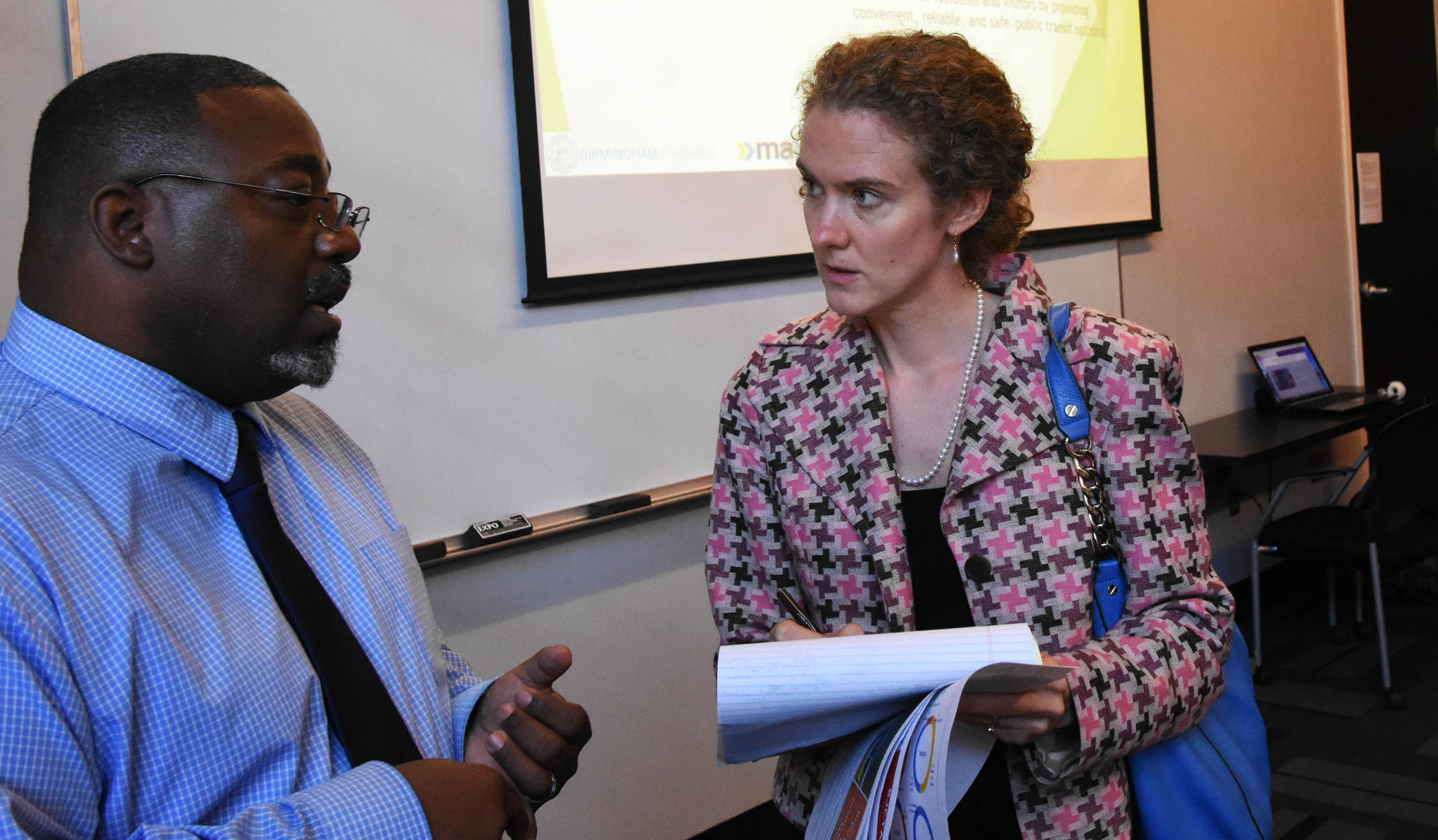Darrell Howard talks with Sarah Stokes of Southern Environmental Law Center. (Solomon Crenshaw Jr., special to The Times)