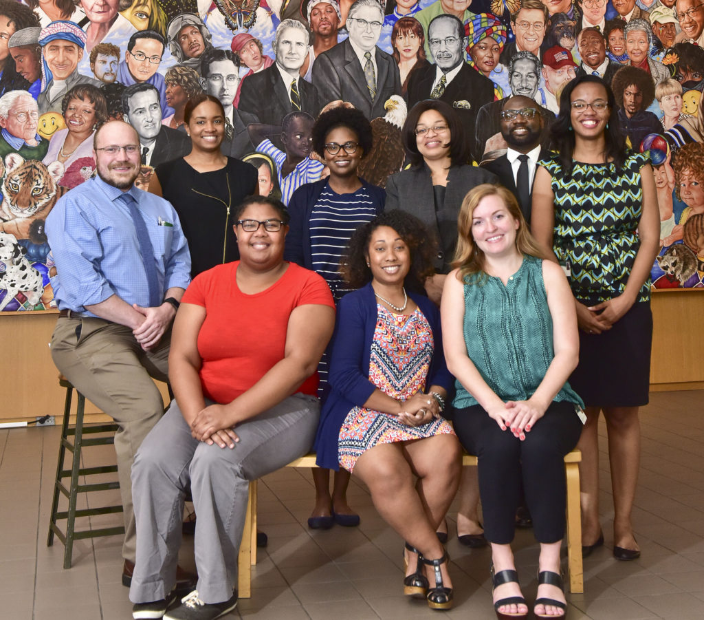 Young professional board members met at Sept. 20 at the Birmingham Public Library. Board members, bottom row from left, Latasha Watters, Tevis Owens and Leah Bigbee. Back row, seated, Eric Martin Scott, Alexis Barton, Tiffanie Jeter, Sebrina Stoutemire, James Sullivan and Kamina Perdue. (Frank Couch, for The Birmingham Times)