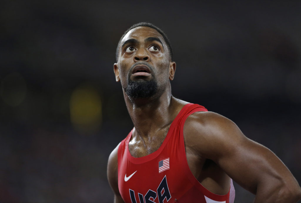 FILE - In this Aug. 23, 2015, file photo, United States' Tyson Gay looks at his time from a men's 100-meter semifinal at the World Athletics Championships at the Bird's Nest stadium in Beijing. The 15-year-old daughter of Olympic sprinter Tyson Gay has been fatally shot in Kentucky, the athlete's agent and authorities said Sunday, Oct. 16, 2016. Trinity Gay died at the University of Kentucky Medical Center, the coroner's office for Fayette County said in a statement.  (AP Photo/David J. Phillip, File)