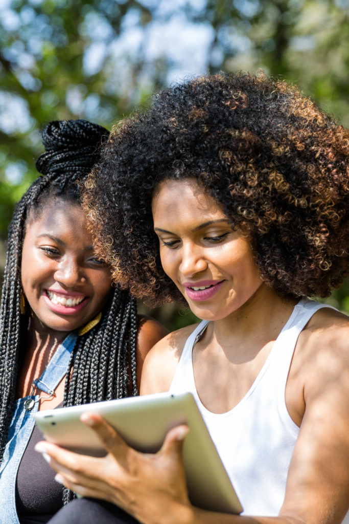 Black millennials are 11.5 million strong and lead a viral vanguard that is driving African-Americans’ innovative use of mobile technology and closing the digital divide. (Adobe stock)