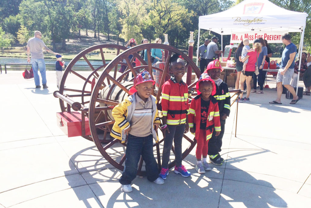 Children dressed as firefighters take part in the Second Annual Fire Department Expo. 