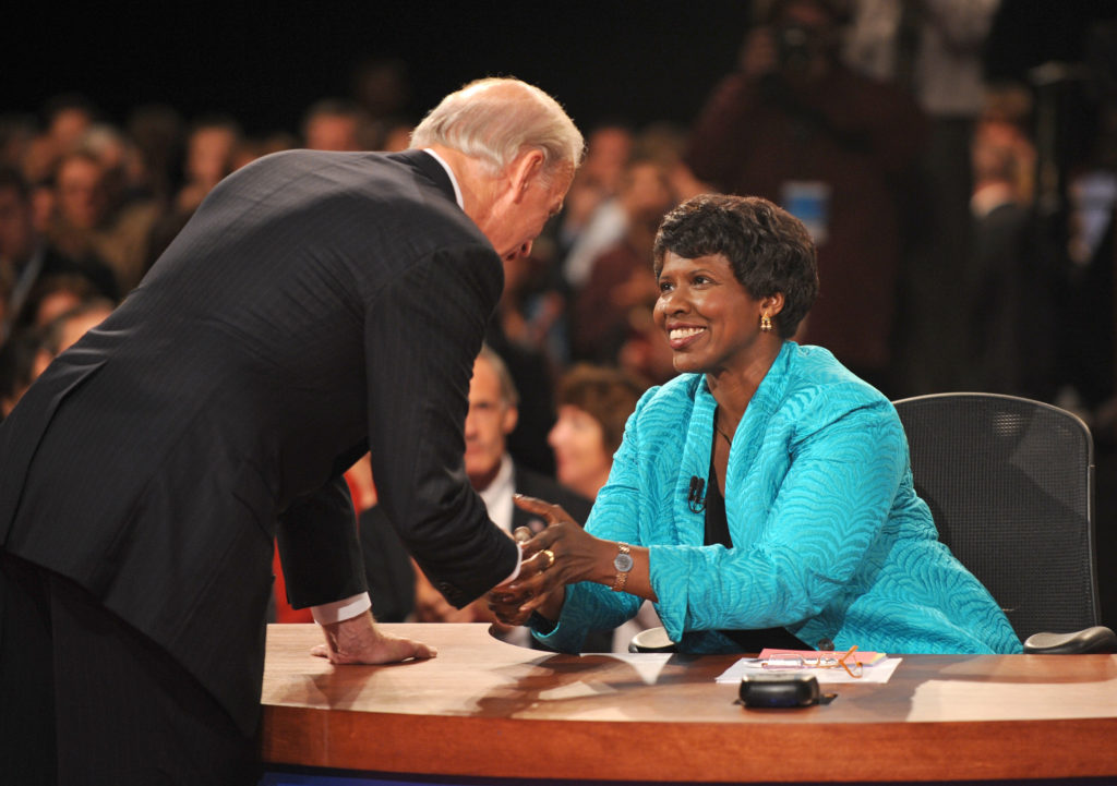 In this Oct. 2, 2008, file photo, PBS journalist and debate moderator Gwen Ifill and then-Democratic vice presidential nominee, Sen. Joe Biden, D-Del., left, shake hands at the end of his vice presidential debate with Republican rival, Alaska Gov. Sarah Palin in St. Louis, Mo. Ifill died on Monday, Nov. 14, 2016, of cancer, PBS said. She was 61. (AP Photo/Don Emmert, File Pool)