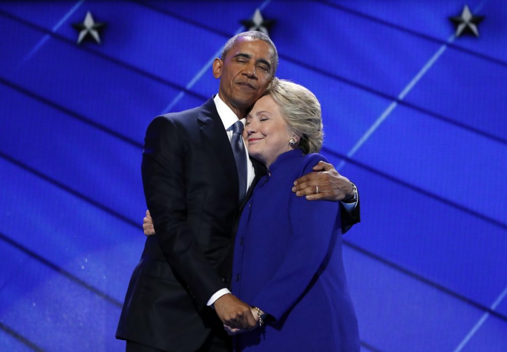Democratic presidential nominee gets a hug from President Barack Obama during the Democratic National Convention. (AP Photo/J. Scott Applewhite)
