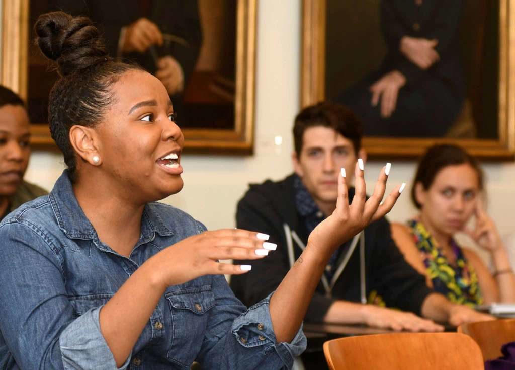 In this Wednesday, Nov. 9, 2016 photo, Sarita Smith speaks during the "Faith and Politics" class at Emory University in Atlanta. The day after Donald Trump had won the presidency, graduate students talked of being shocked and wounded, fearful and horrified. (Associated Press)