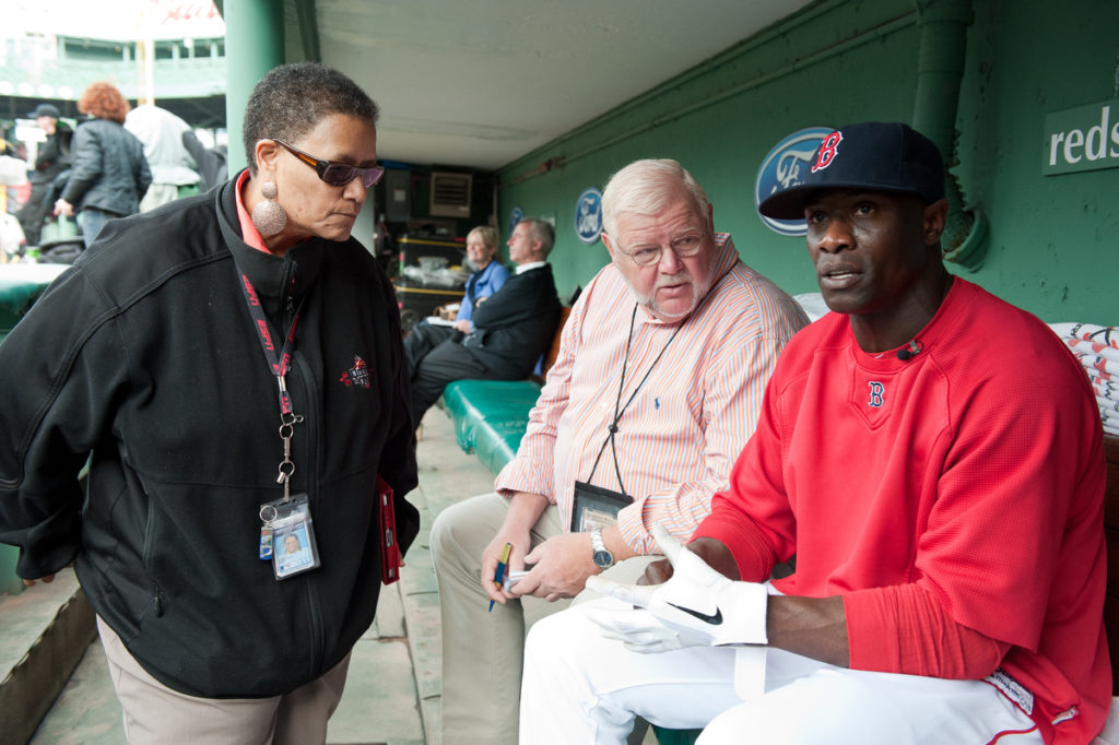 Claire Smith (left), with MLB.com’s Marty Noble, interviews Red Sox star Mike Cameron. (Provided photo) 