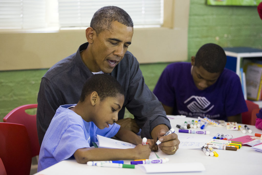President Obama works with some children at the Boys & Girls Club of America.(Evan Vucci, Associated Press)