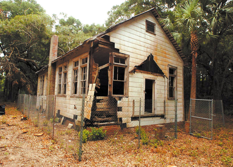 This undated photo shows a one-room schoolhouse built in the 1920s to teach black children on St. Simons Island, Ga. Preservationists saved the Harrington School from scheduled demolition in 2010 and since then have spent about $300,000 to stabilize its deteriorating frame and leaky roof. (Bobby Haven, Associated Press)