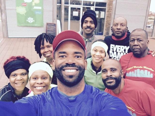 Eric Thomas takes a photo with a group of runners before their weekly workout. The group is part of Black People Run Bike and Swim, a group of diverse members that promote fitness activities for African-Americans. (Provided photos)