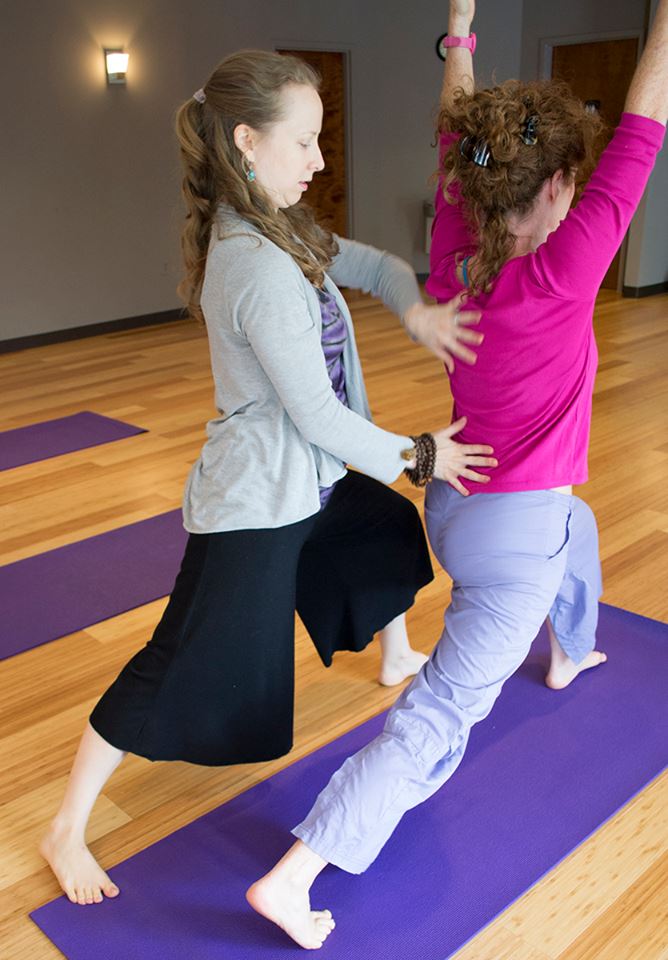 Lauren Rae Brown, yoga instructor at Embody Practice Center with client (provided photo)