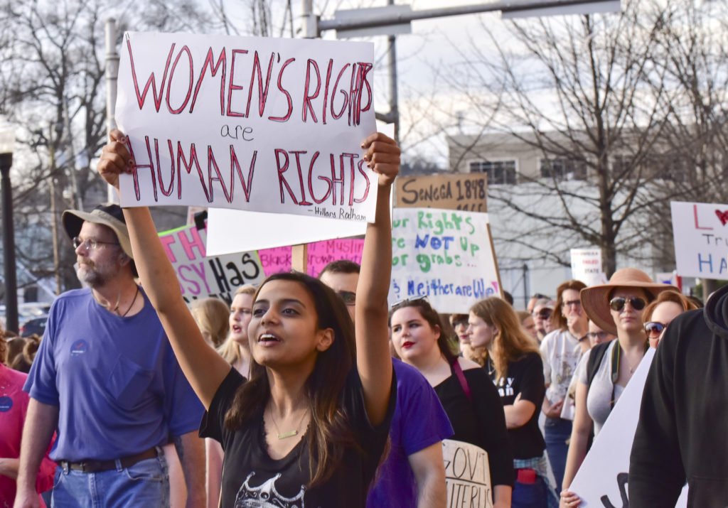 Thousands gathered in Kelly Ingram Park and marched in the Women's March Alabama Saturday January 21, 2017 in Birmingham, Alabama. They listened to speakers, sang, chanted and displayed signs before they marched from the to City Hall and back to the park arriving moments after the last  of the marchers departed.   (Frank Couch, special to The Times)