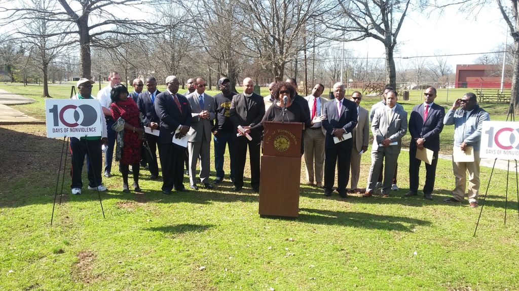 Jefferson County Commissioner Sandra Little Brown (at podium), with city, civic and community leaders, addresses the media during a press conference on steps planned to reduce violence in Birmingham. (Barnett Wright, The Birmingham Times)