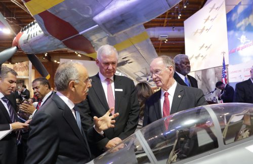 Governor Robert Bentley speaks with Leonardo President Filippo Bagnato, Leonardo DRS CEO Bill Lynn at the Leonardo DRS T-100 trainer jet announcement in Tuskegee, Ala. 