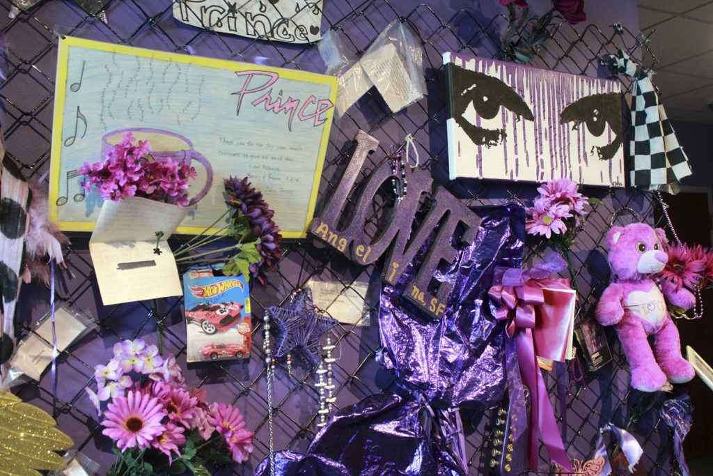 In this Nov. 2, 2016 photo, a replica of the Memorial Fence is shown at Prince's Paisley Park in Chanhassen, Minn. Paisley Park, home and studio of the late musician Prince, is open for public tours. Fans left memorials on Paisley Park after his death. (AP Photo/Jeff Baenen)