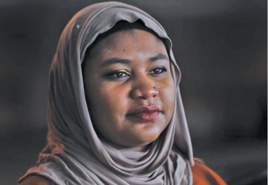 Fatimah Farooq counsels refugees from places like Iraq and Syria, who have been victims of trauma, torture or sex trafficking. (Paul Sancya, The Associated Press)