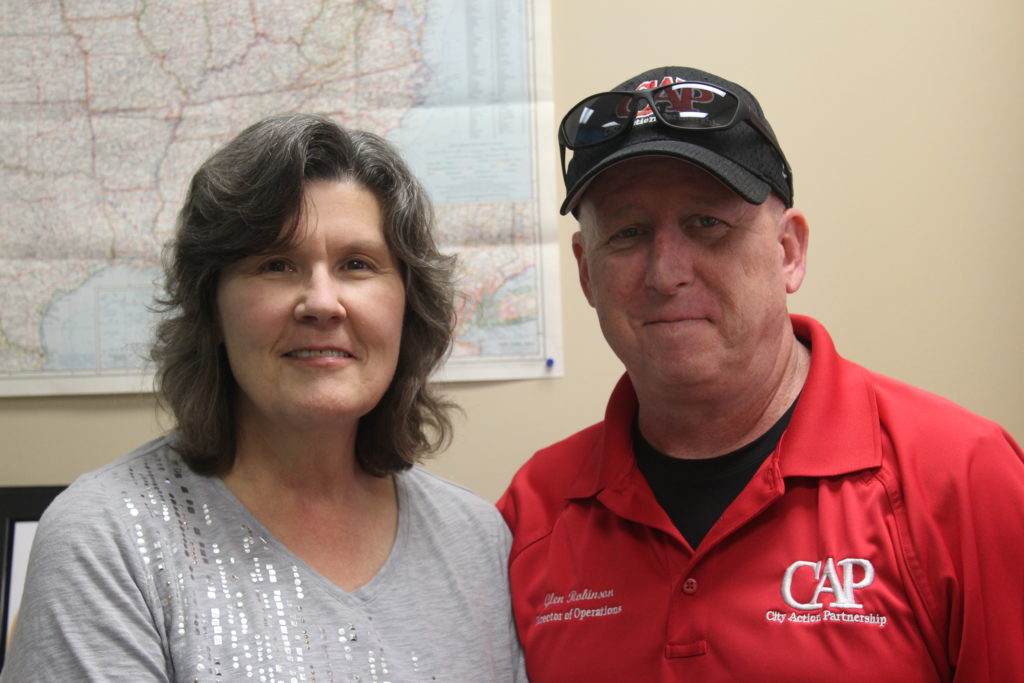 Mollie Hester (left),  manager at Travelers Aid Greater Birmingham with Glen Robinson, interim director, with City Action Partnership. (Ariel Worthy, The Birmingham Times)