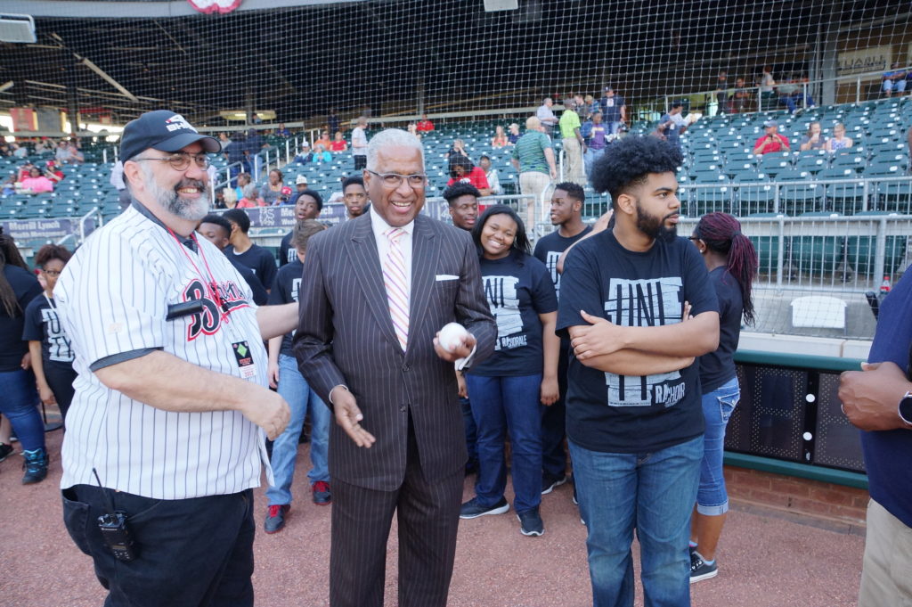 Don Lee, corporate sales Manager, Birmingham Barons; Mayor William Bell and DeZell Plump, choir director at Restoration Academy. (Provided photo)