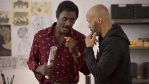 Idris Elba (left) as Kent and director John Ridley behind the scenes of 'Guerrilla,' which premieres on Showtime. (Provided photo)