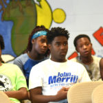 Youth listen during Saturday mentoring session