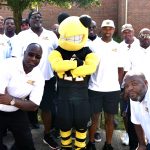 Team members pose with Stinger
