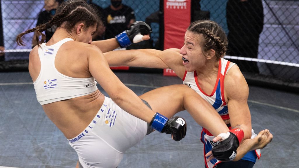 Caroline “Taz Gallardo dodges a leg kick to strike Camila Rivarola in their recent Combate Global women's bout in Miami.  (Scott Hirano/Combate Global)