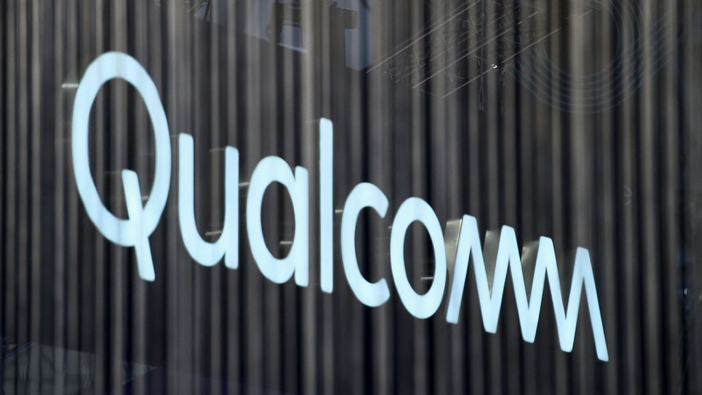 A Qualcomm logo. Qualcomm has reported third-quarter revenue of $8.44 billion, down 23% YoY. (JOSEP LAGO/AFP via Getty Images)